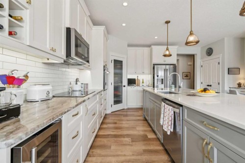 14 Riviera View, Cochrane, AB - Indoor Photo Showing Kitchen With Upgraded Kitchen