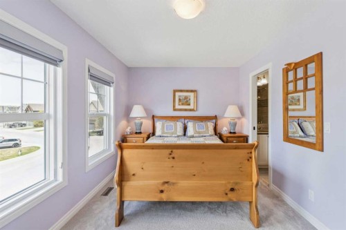 14 Riviera View, Cochrane, AB - Indoor Photo Showing Bedroom