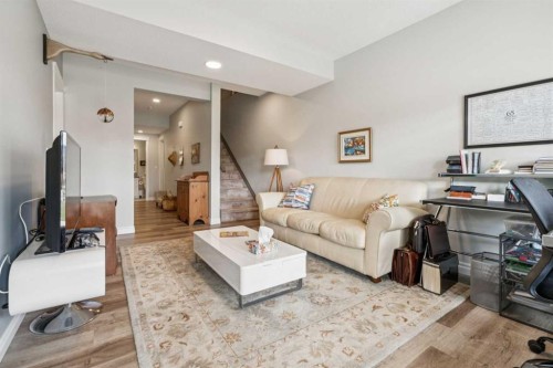 14 Riviera View, Cochrane, AB - Indoor Photo Showing Living Room