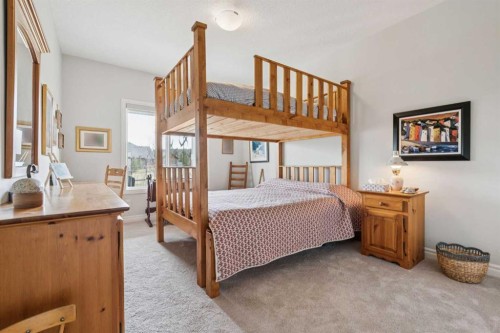 14 Riviera View, Cochrane, AB - Indoor Photo Showing Bedroom