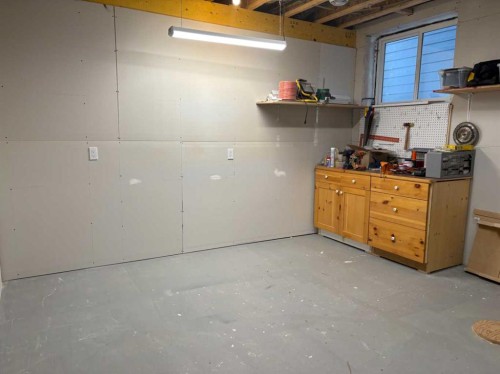 14 Riviera View, Cochrane, AB - Indoor Photo Showing Basement