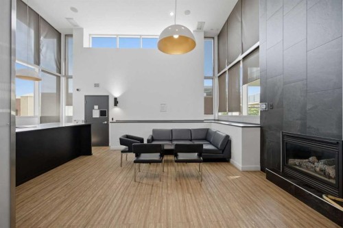 206-210 15 Avenue Se, Calgary, AB - Indoor With Fireplace