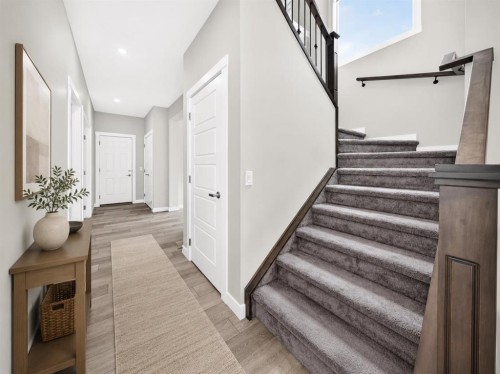 137 Creekside Way Sw, Calgary, AB - Indoor Photo Showing Other Room