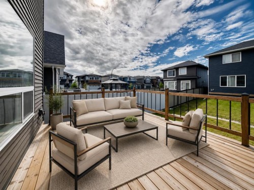 137 Creekside Way Sw, Calgary, AB - Outdoor With Deck Patio Veranda With Exterior