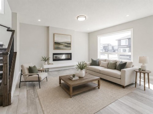 137 Creekside Way Sw, Calgary, AB - Indoor Photo Showing Living Room