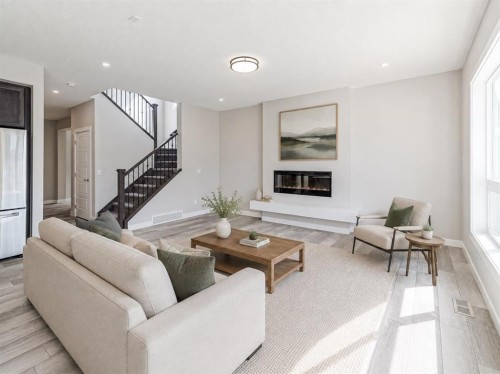 137 Creekside Way Sw, Calgary, AB - Indoor Photo Showing Living Room