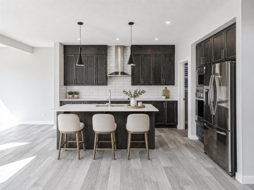 137 Creekside Way Sw, Calgary, AB - Indoor Photo Showing Kitchen With Stainless Steel Kitchen With Upgraded Kitchen