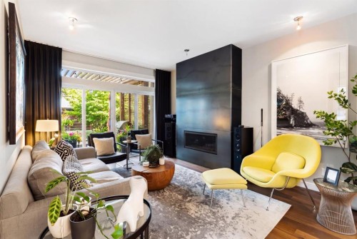 2201 Bowness Road Nw, Calgary, AB - Indoor Photo Showing Living Room With Fireplace