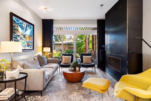 2201 Bowness Road Nw, Calgary, AB - Indoor Photo Showing Living Room With Fireplace