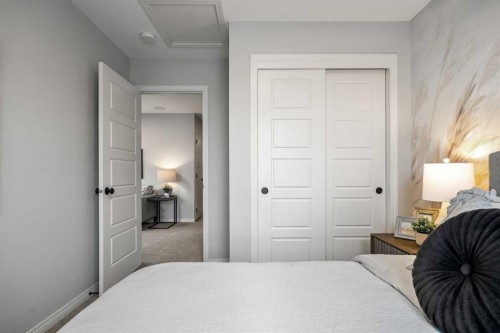 541 Bridgeport Street, Chestermere, AB - Indoor Photo Showing Bedroom