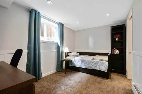 135 Manora Hill Ne, Calgary, AB - Indoor Photo Showing Bedroom
