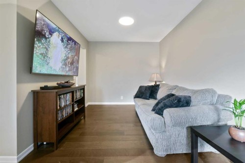 135 Manora Hill Ne, Calgary, AB - Indoor Photo Showing Living Room