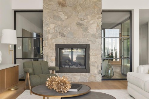 692 West Chestermere Drive, Chestermere, AB - Indoor Photo Showing Living Room With Fireplace