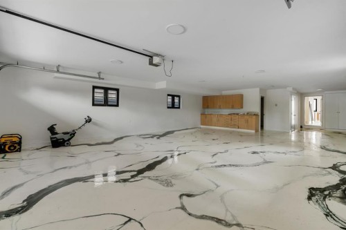 692 West Chestermere Drive, Chestermere, AB - Indoor Photo Showing Garage
