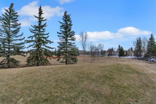 174 Woodmont Terrace Sw, Calgary, AB - Outdoor With View