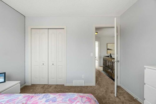 19 Citadel Ridge Close Nw, Calgary, AB - Indoor Photo Showing Bedroom