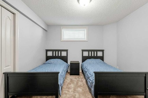 19 Citadel Ridge Close Nw, Calgary, AB - Indoor Photo Showing Bedroom