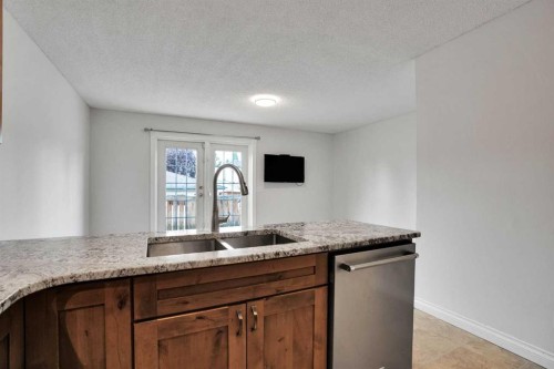 7152 Sierra Morena Boulevard Sw, Calgary, AB - Indoor Photo Showing Kitchen With Double Sink