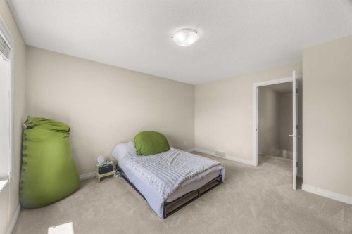35 Covepark Place Ne, Calgary, AB - Indoor Photo Showing Bedroom