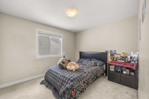 35 Covepark Place Ne, Calgary, AB - Indoor Photo Showing Bedroom