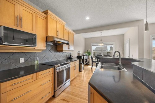 35 Covepark Place Ne, Calgary, AB - Indoor Photo Showing Kitchen With Stainless Steel Kitchen With Double Sink
