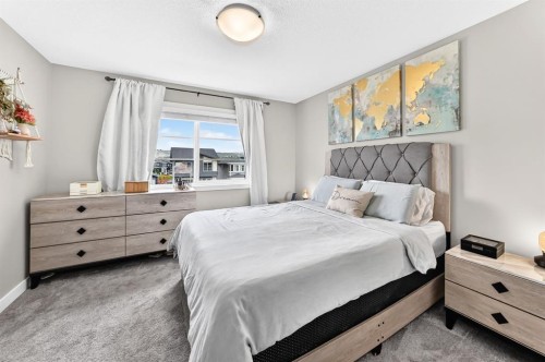 58 Precedence Link, Cochrane, AB - Indoor Photo Showing Bedroom