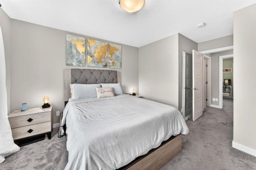 58 Precedence Link, Cochrane, AB - Indoor Photo Showing Bedroom