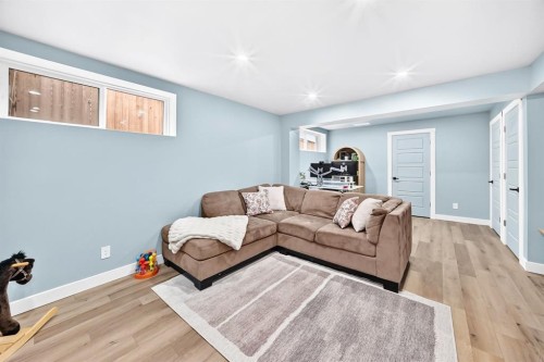 58 Precedence Link, Cochrane, AB - Indoor Photo Showing Living Room