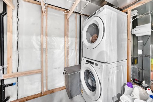 58 Precedence Link, Cochrane, AB - Indoor Photo Showing Laundry Room