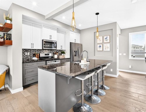 58 Precedence Link, Cochrane, AB - Indoor Photo Showing Kitchen With Upgraded Kitchen