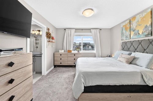 58 Precedence Link, Cochrane, AB - Indoor Photo Showing Bedroom