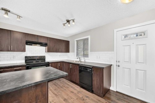 152 Pantego Lane Nw, Calgary, AB - Indoor Photo Showing Kitchen With Double Sink