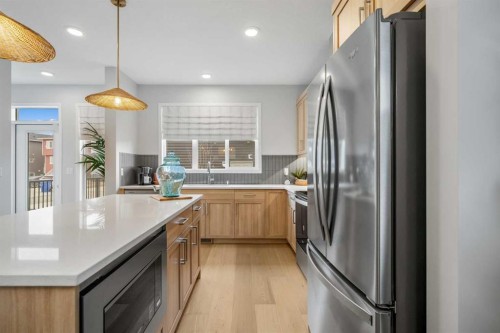 545 Bridgeport Street, Chestermere, AB - Indoor Photo Showing Kitchen With Upgraded Kitchen
