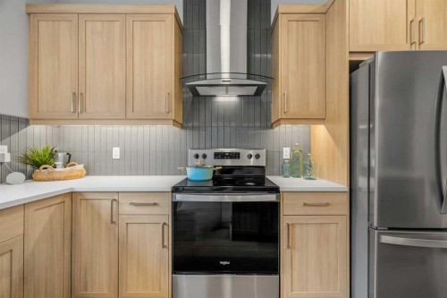 545 Bridgeport Street, Chestermere, AB - Indoor Photo Showing Kitchen With Upgraded Kitchen