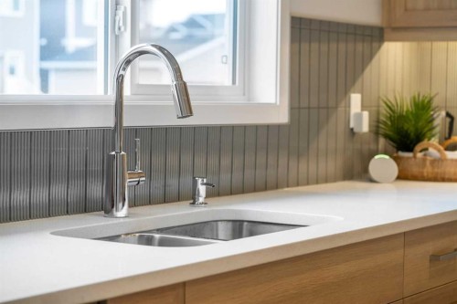 545 Bridgeport Street, Chestermere, AB - Indoor Photo Showing Kitchen With Double Sink