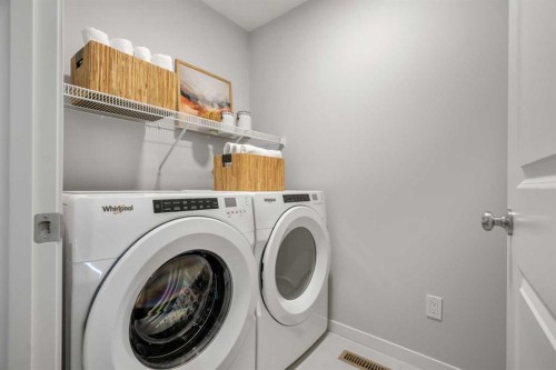 545 Bridgeport Street, Chestermere, AB - Indoor Photo Showing Laundry Room