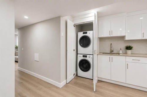 12 Cedargrove Road Sw, Calgary, AB - Indoor Photo Showing Laundry Room