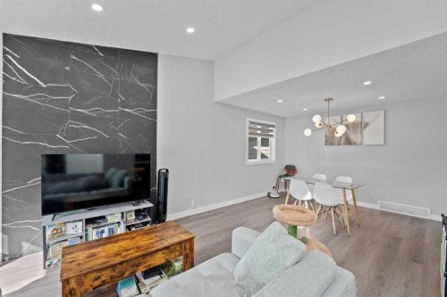 12 Cedargrove Road Sw, Calgary, AB - Indoor Photo Showing Living Room
