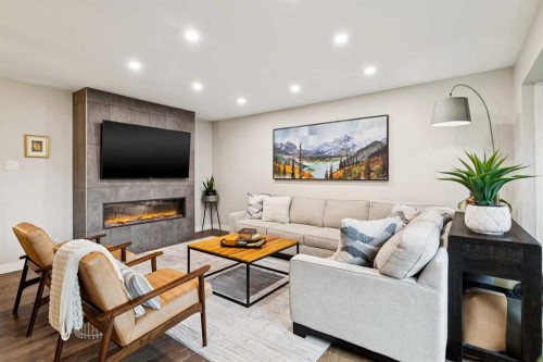 5327 17 Avenue Sw, Calgary, AB - Indoor Photo Showing Living Room With Fireplace