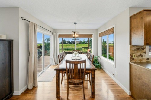474 Tuscany Ravine Road Nw, Calgary, AB - Indoor Photo Showing Dining Room