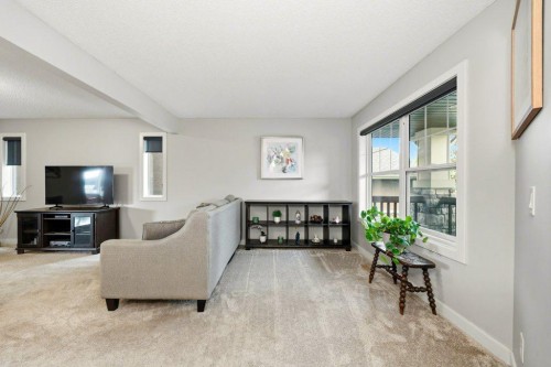 474 Tuscany Ravine Road Nw, Calgary, AB - Indoor Photo Showing Living Room