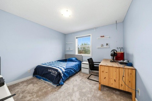 474 Tuscany Ravine Road Nw, Calgary, AB - Indoor Photo Showing Bedroom