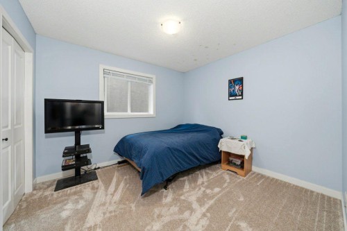 474 Tuscany Ravine Road Nw, Calgary, AB - Indoor Photo Showing Bedroom