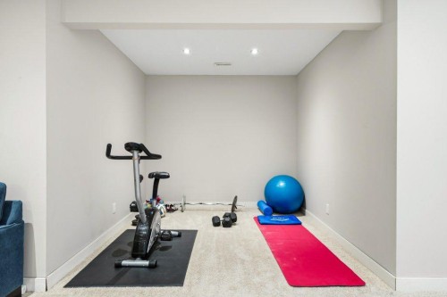 474 Tuscany Ravine Road Nw, Calgary, AB - Indoor Photo Showing Gym Room