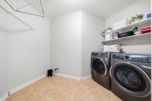 474 Tuscany Ravine Road Nw, Calgary, AB - Indoor Photo Showing Laundry Room