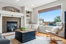 474 Tuscany Ravine Road Nw, Calgary, AB  - Indoor Photo Showing Living Room With Fireplace 