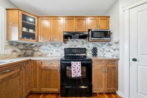 474 Tuscany Ravine Road Nw, Calgary, AB - Indoor Photo Showing Kitchen