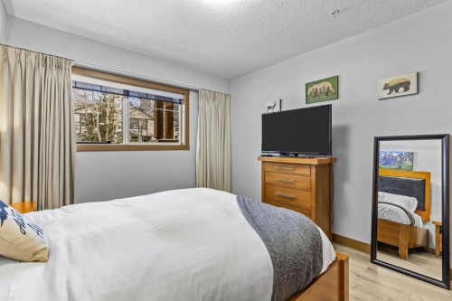 3106-250 2Nd Avenue, Dead Man'S Flats, AB - Indoor Photo Showing Bedroom