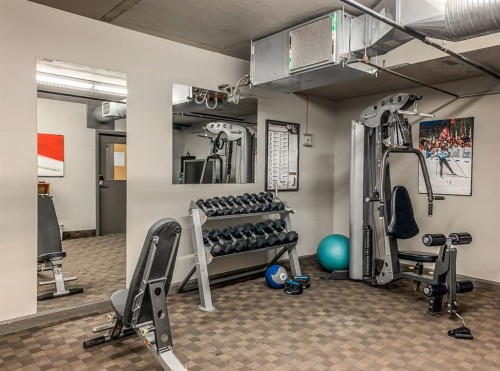 3106-250 2Nd Avenue, Dead Man'S Flats, AB - Indoor Photo Showing Gym Room
