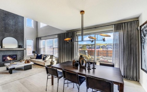 525 Lucas Way Nw, Calgary, AB - Indoor With Fireplace